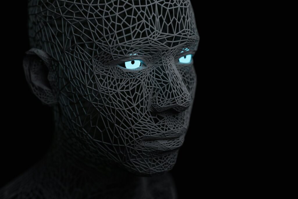 a man with blue eyes and a black background